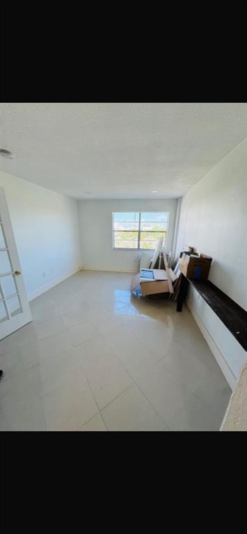 1130 11th Street, Unit 6J Miami Beach, FL 33139 - Photo 4 of 18 a view of a room with a window