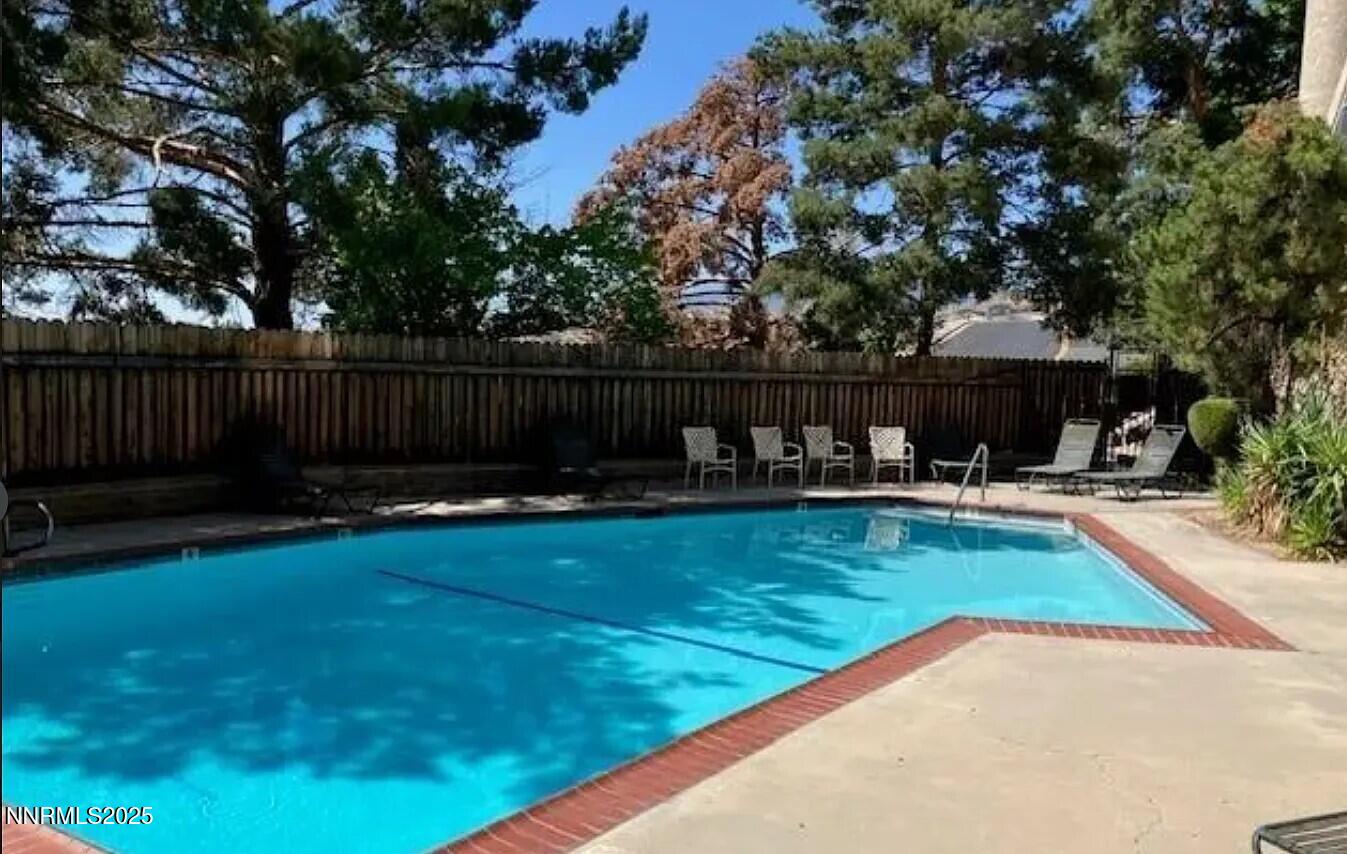 139 Vista Rafael Parkway Reno, NV 89503 - Photo 12 of 13 a view of backyard with swimming pool and furniture