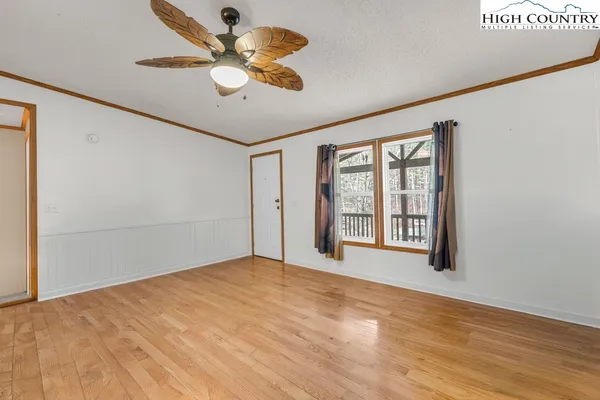 a kitchen with a sink cabinets and appliances