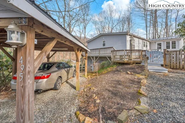 a view of backyard and trees