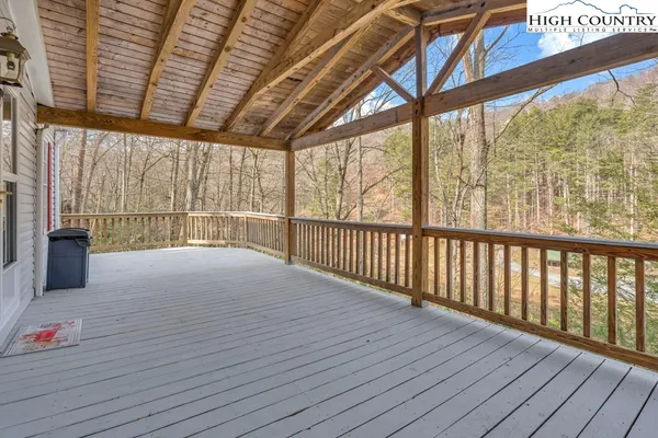 a balcony with wooden floor