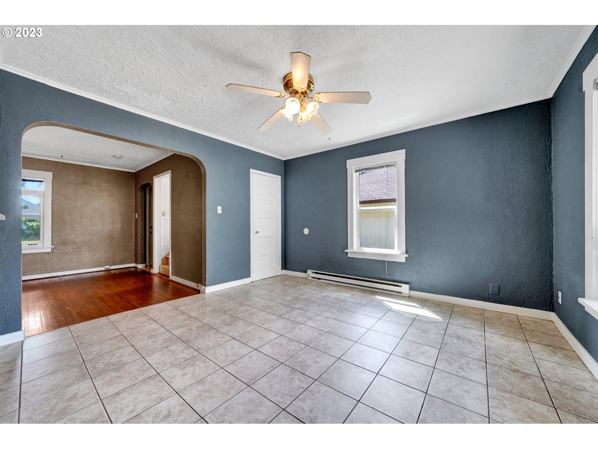661 18th Avenue Longview, WA 98632 - Photo 11 of 39 a view of an empty room with window and wooden floor