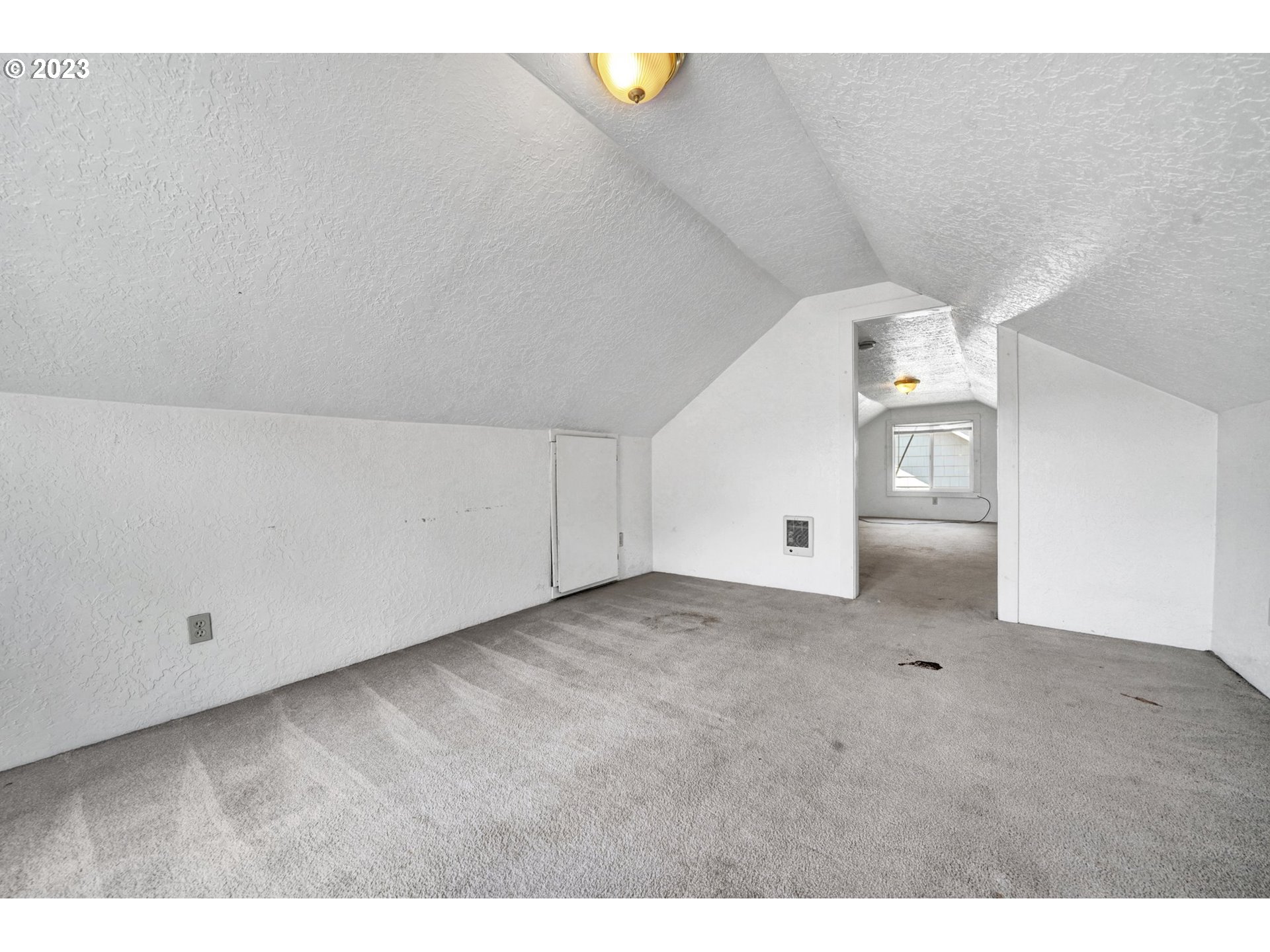 661 18th Avenue Longview, WA 98632 - Photo 24 of 39 a view of a big room with closet and windows