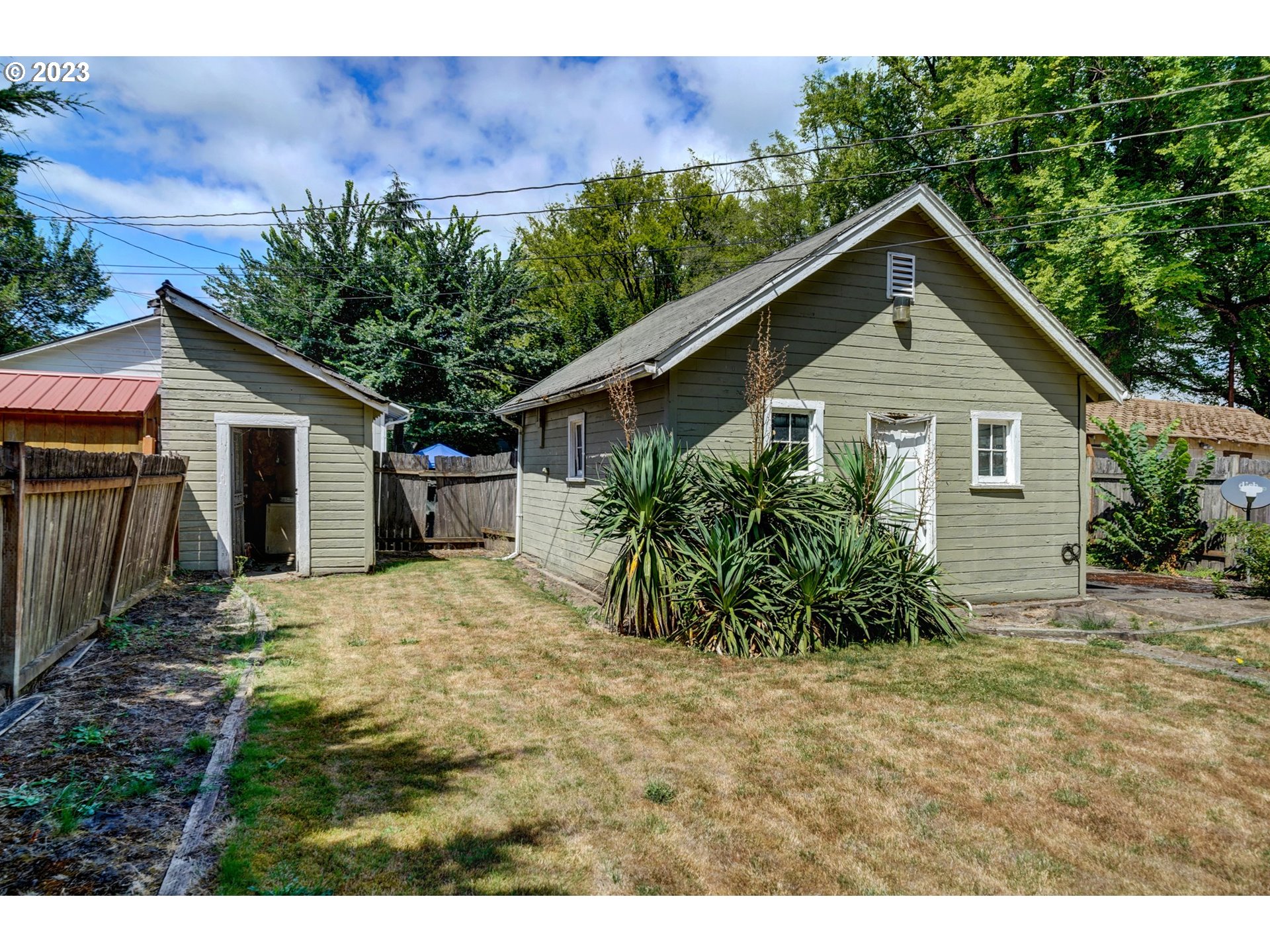 661 18th Avenue Longview, WA 98632 - Photo 34 of 39 a view of a backyard with plants and a small yard