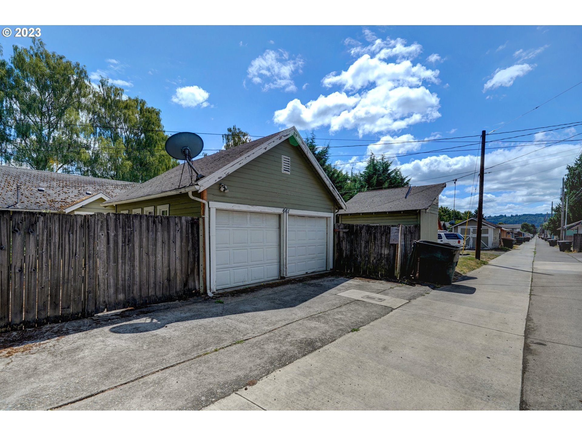 661 18th Avenue Longview, WA 98632 - Photo 36 of 39 a view of a house with a garage
