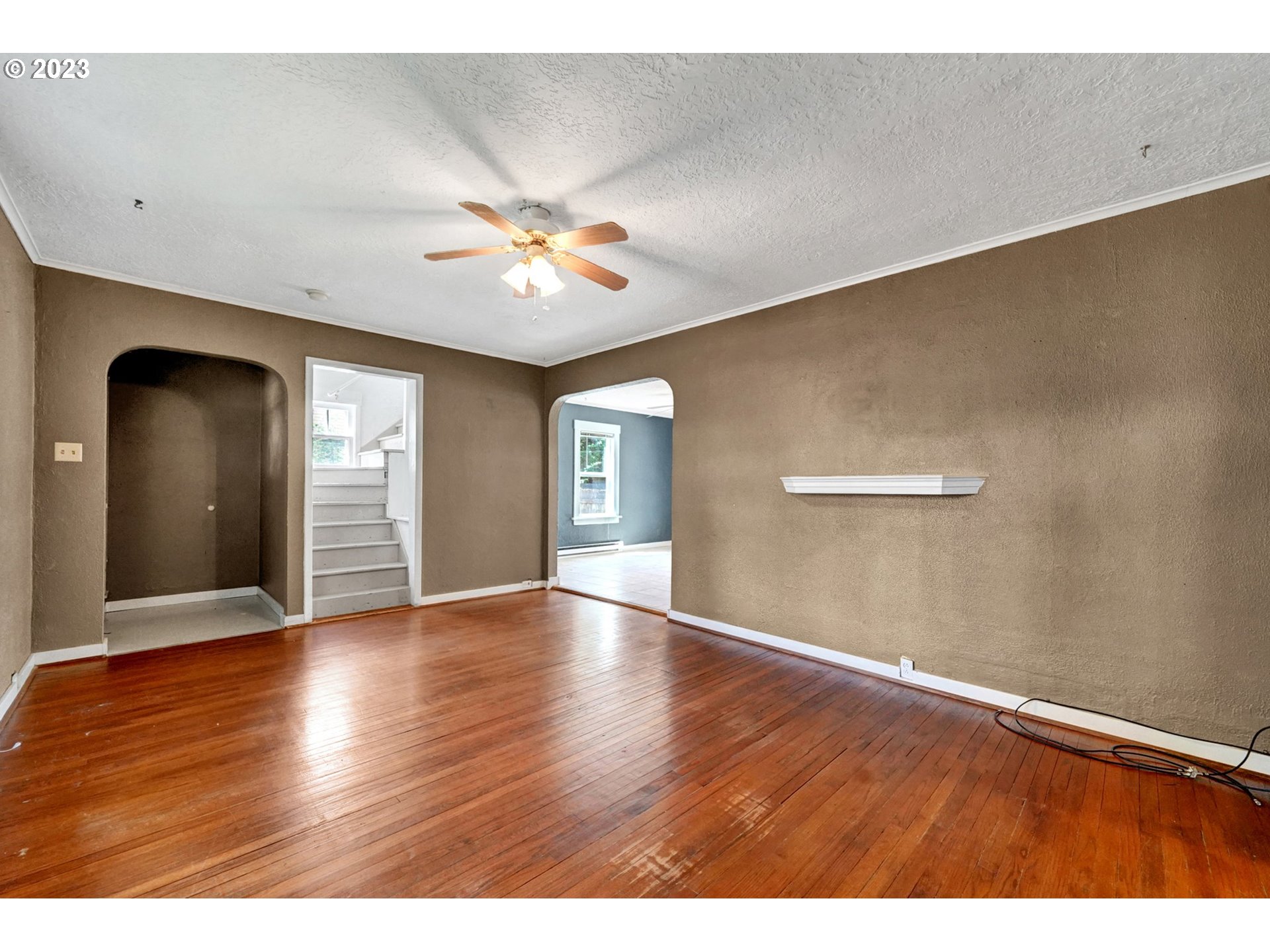661 18th Avenue Longview, WA 98632 - Photo 5 of 39 a view of an empty room with window and wooden floor