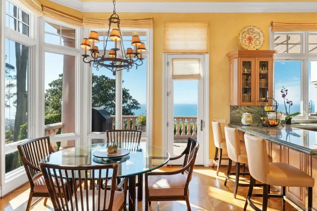 a view of a balcony with furniture