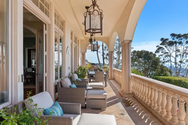 a balcony with furniture