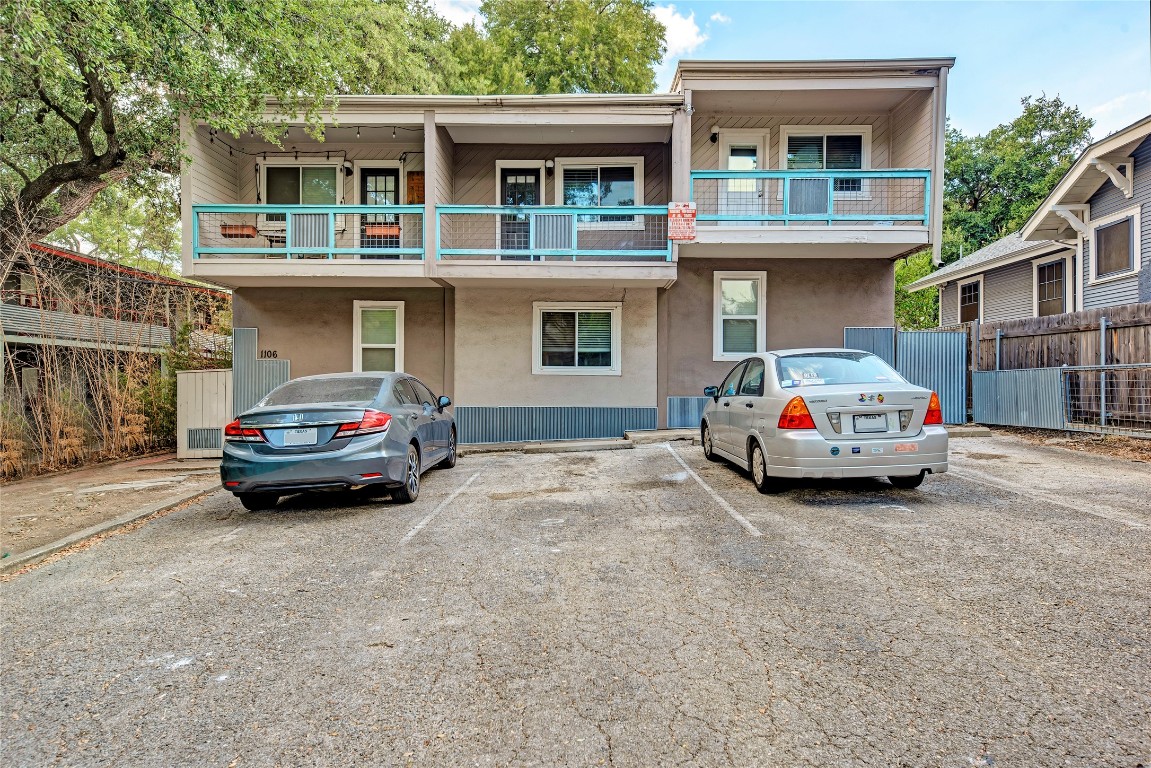 1106 West 22nd Street, Unit 4 Austin, TX 78705 - Photo 2 of 12 a car parked in front of a house