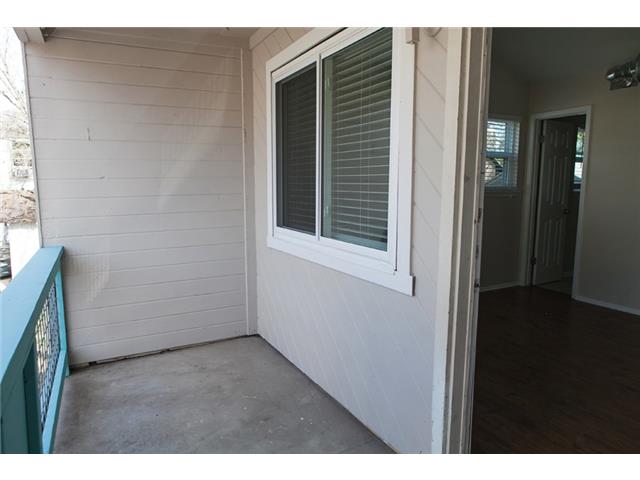 1106 West 22nd Street, Unit 4 Austin, TX 78705 - Photo 5 of 12 a view of an empty room with wooden floor