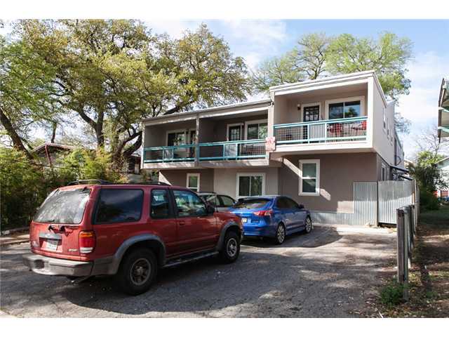 1106 West 22nd Street, Unit 4 Austin, TX 78705 - Photo 6 of 12 a front view of a house with parking space