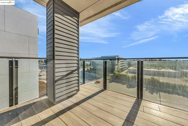 a large kitchen with a table and chairs
