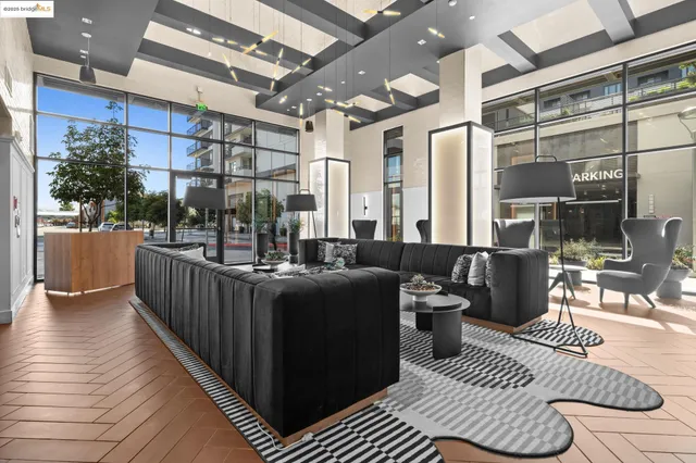 a bathroom with a toilet a sink a mirror a bathtub and vanity