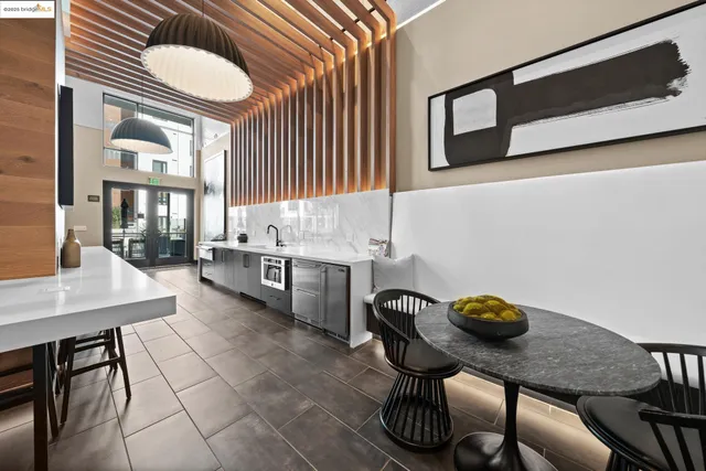 a view of a room with furniture and window