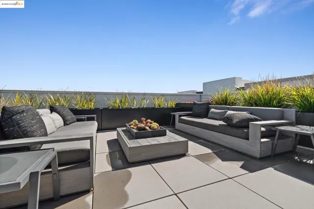 a view of a balcony with chairs