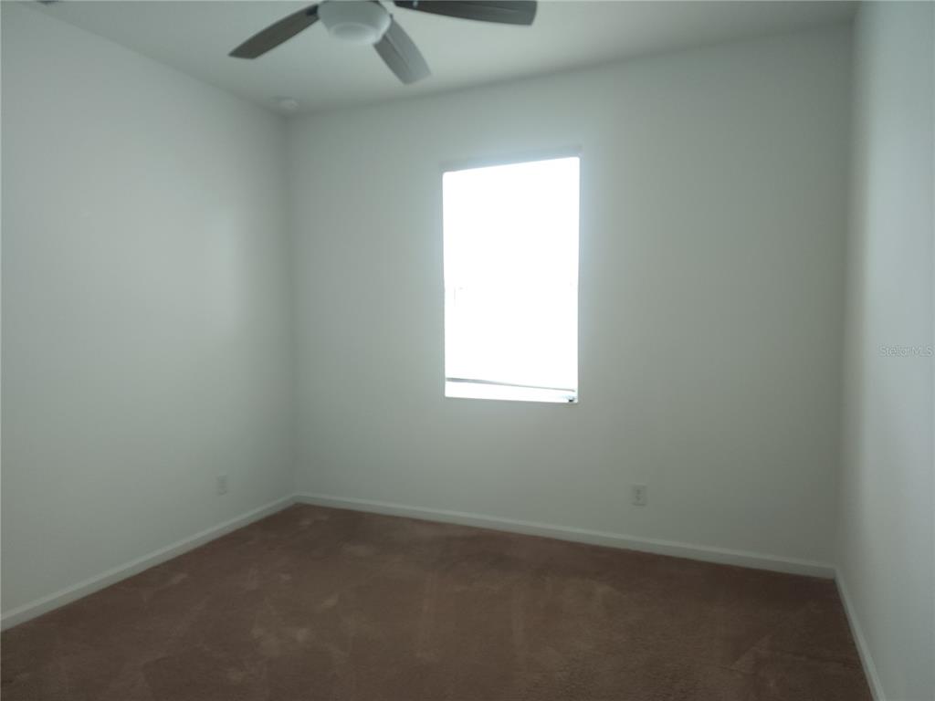 3230 Stratton Circle Kissimmee, FL 34744 - Photo 20 of 28 an empty room with a window