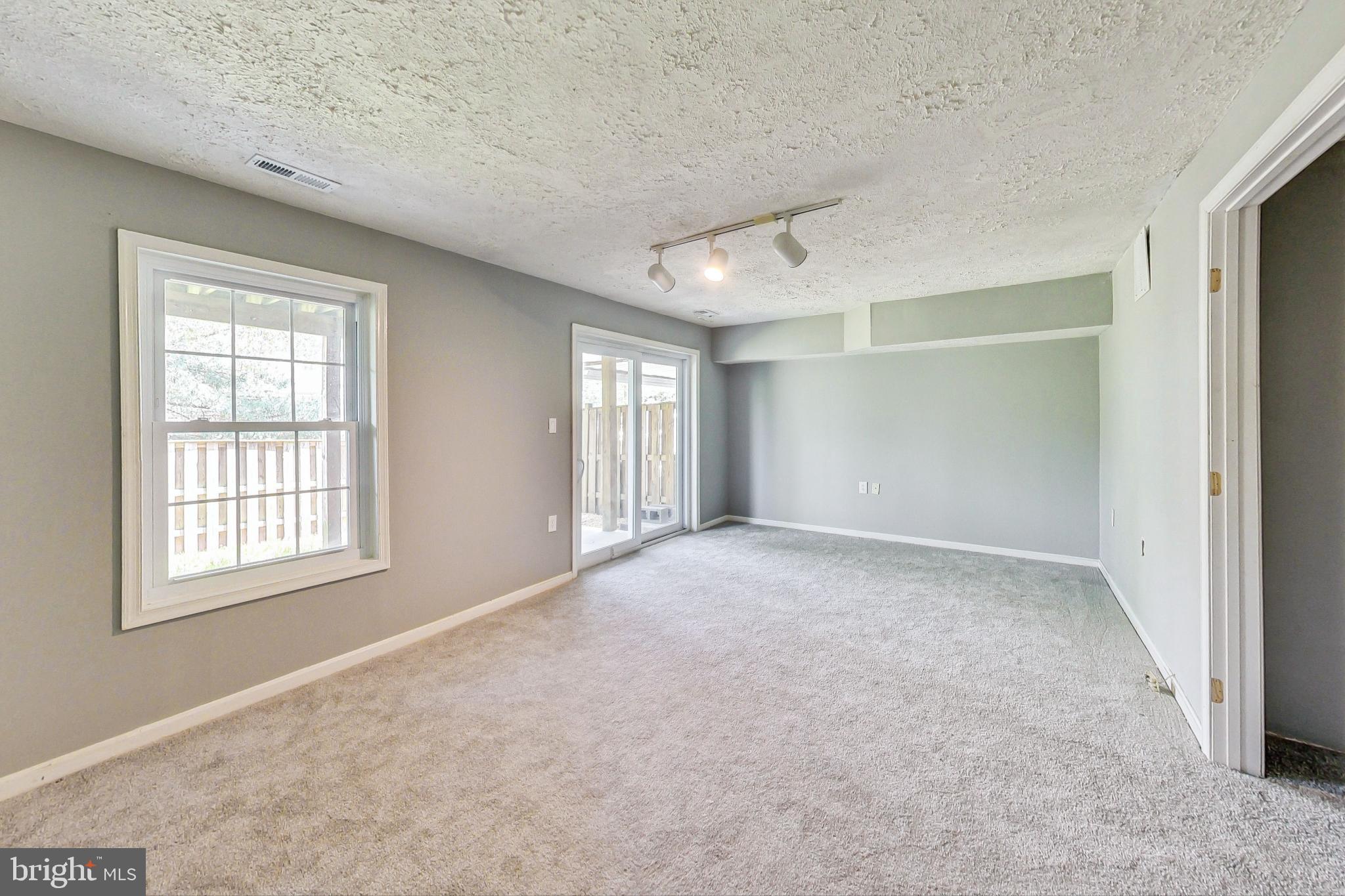 6119 Baldridge Circle Frederick, MD 21701 - Photo 28 of 43 an empty room with windows