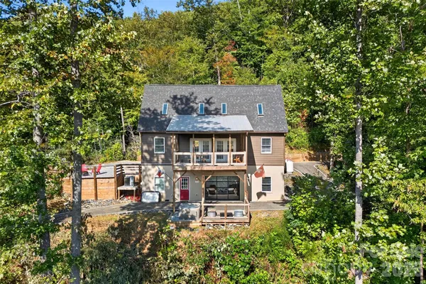 an aerial view of a house with a garden