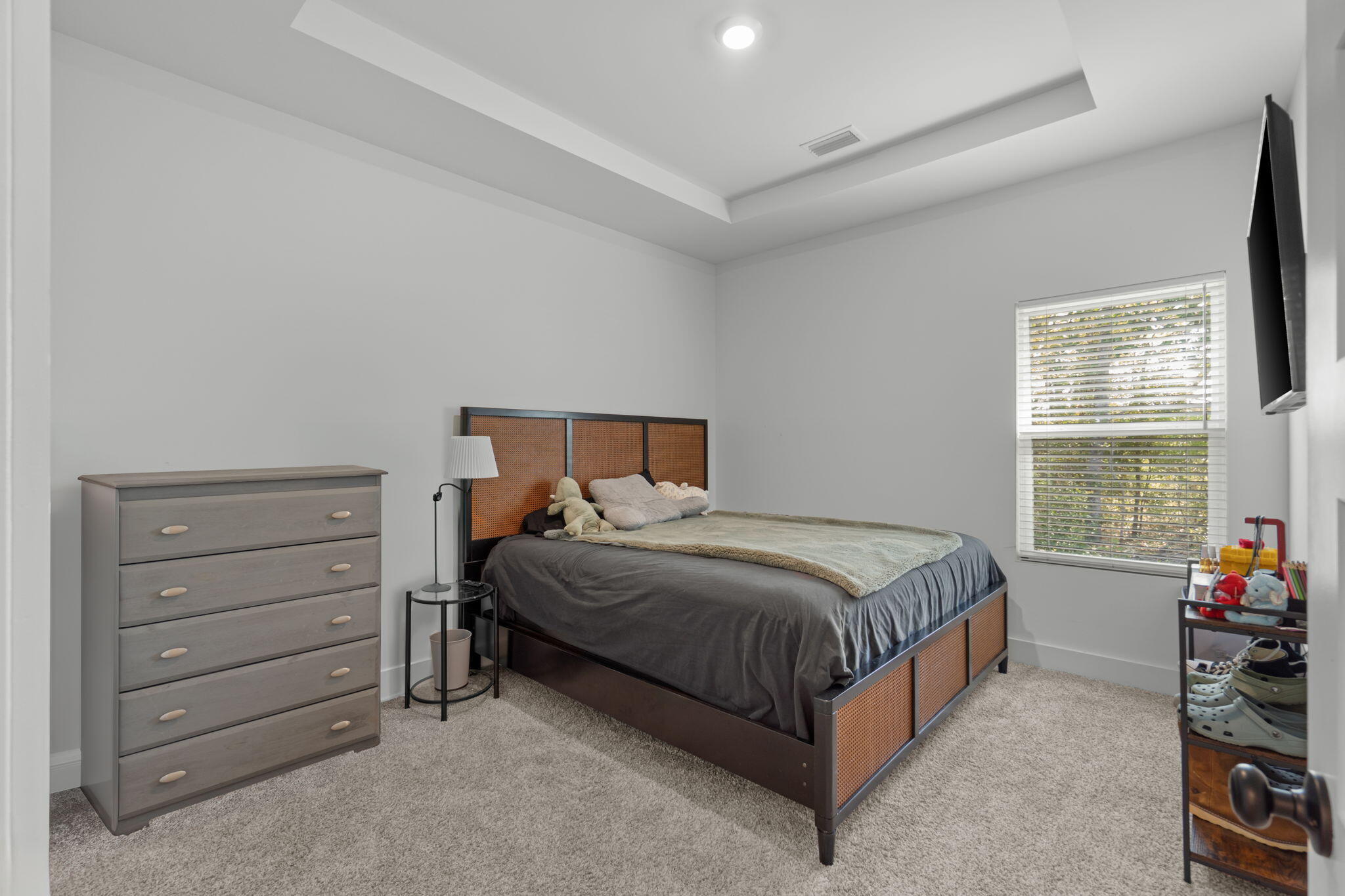 136 Hibernate Way Freeport, FL 32439 - Photo 19 of 55 a bedroom with a bed and a window