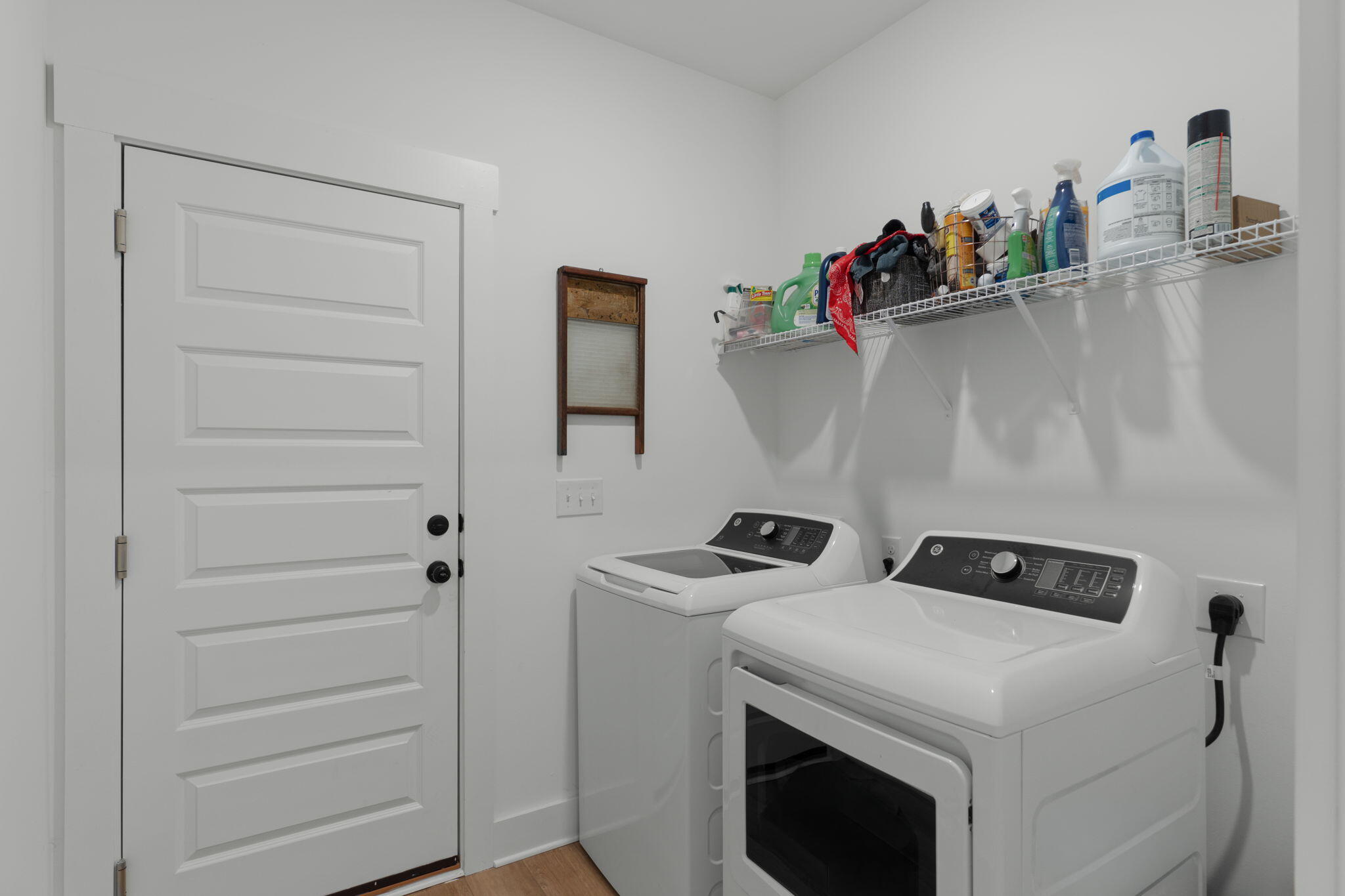 136 Hibernate Way Freeport, FL 32439 - Photo 27 of 55 a utility room with dryer and washer