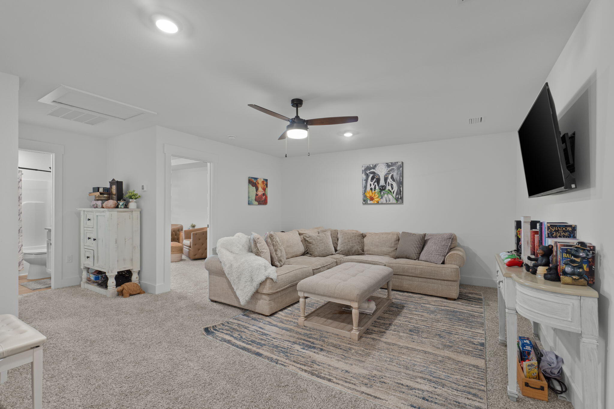 136 Hibernate Way Freeport, FL 32439 - Photo 28 of 55 a living room with furniture and a flat screen tv