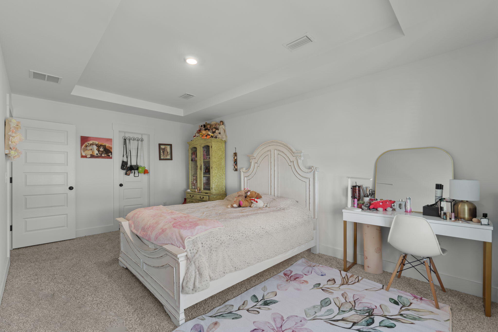 136 Hibernate Way Freeport, FL 32439 - Photo 33 of 55 a bedroom with a bed and a table in it