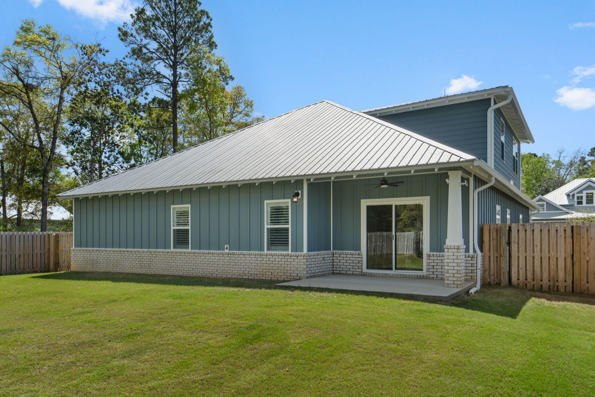 136 Hibernate Way Freeport, FL 32439 - Photo 37 of 55 a front view of a house with garden