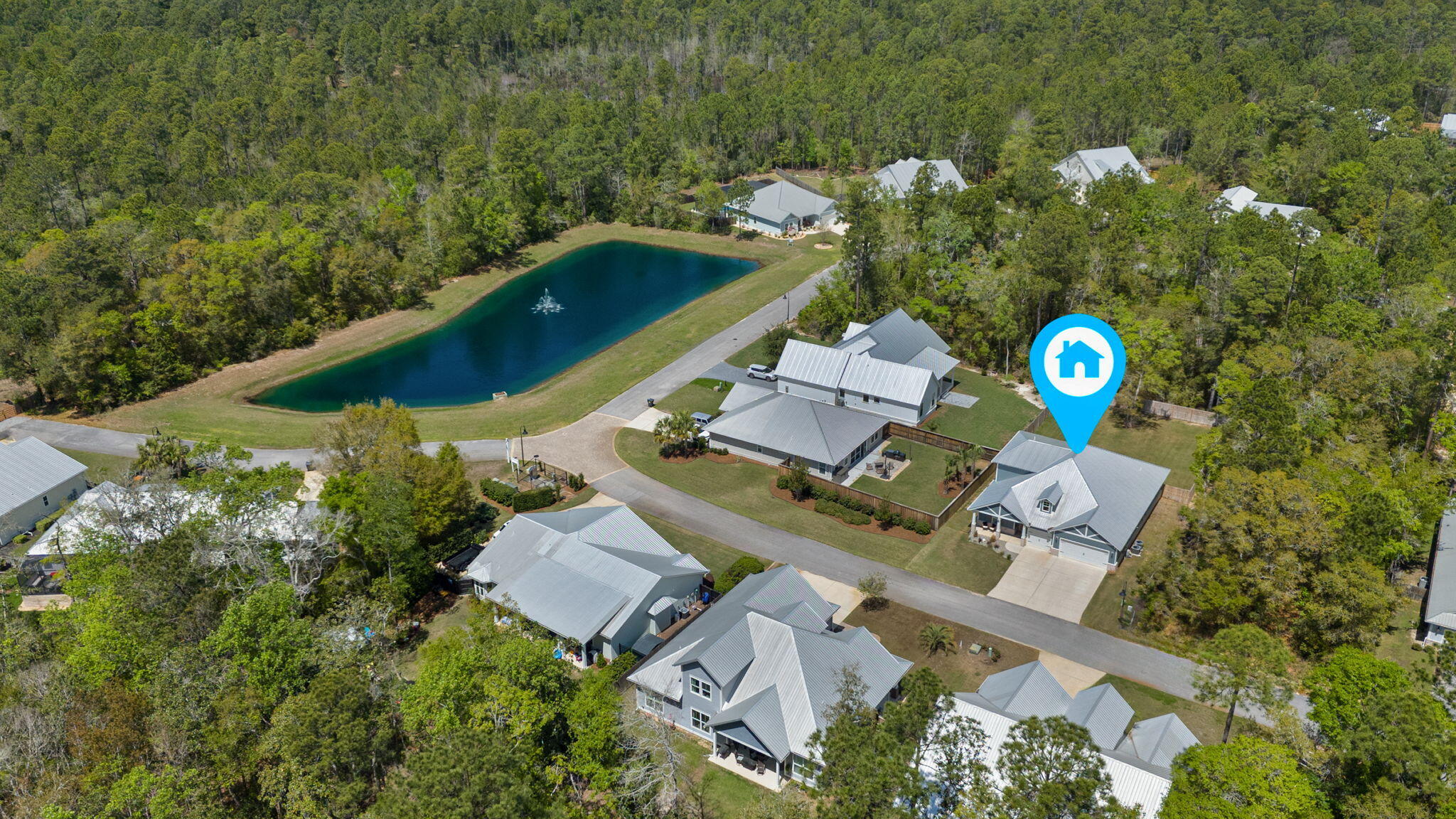 136 Hibernate Way Freeport, FL 32439 - Photo 40 of 55 an aerial view of a house with swimming pool and outdoor space