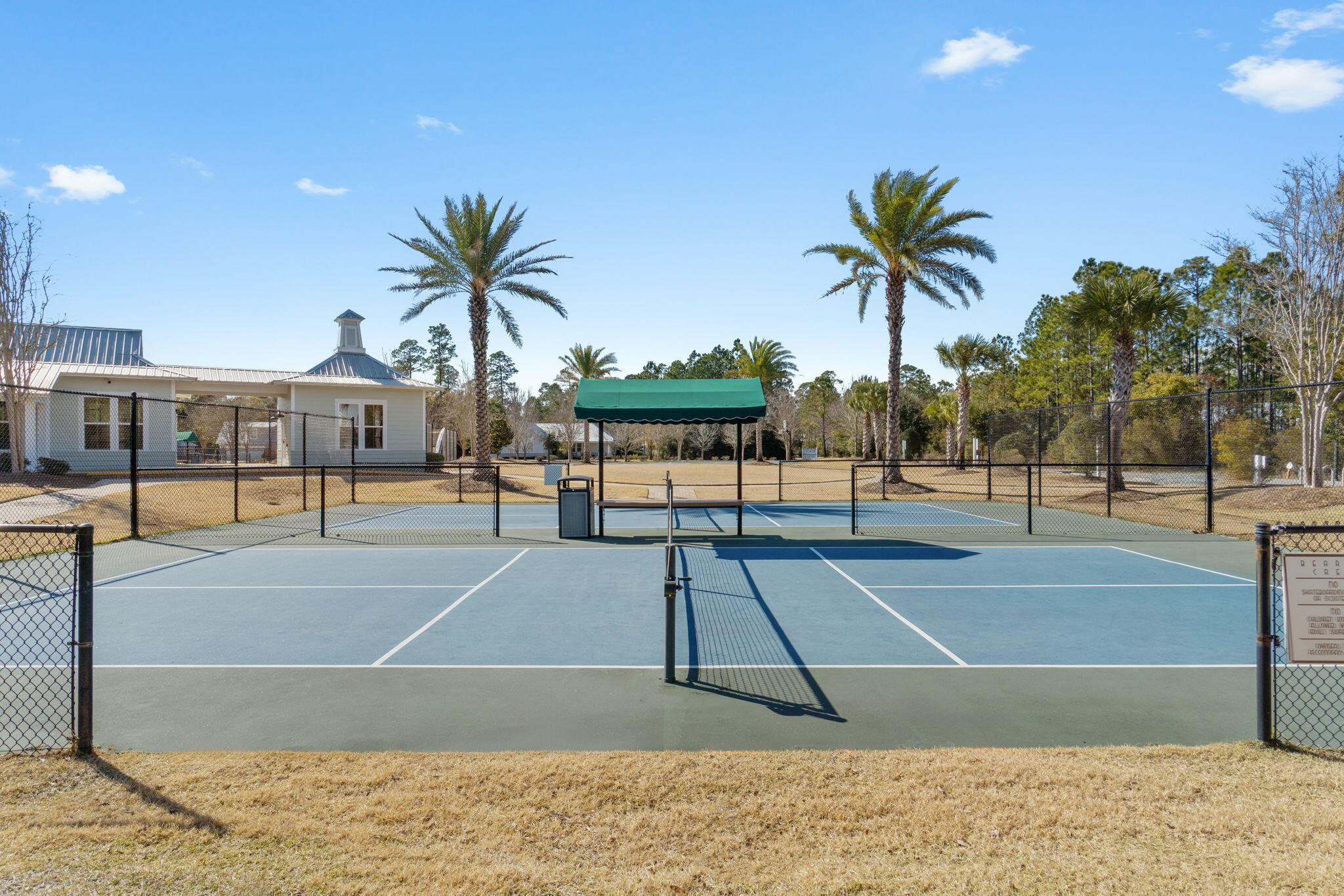 136 Hibernate Way Freeport, FL 32439 - Photo 44 of 55 a view of a swimming pool with a lounge chair