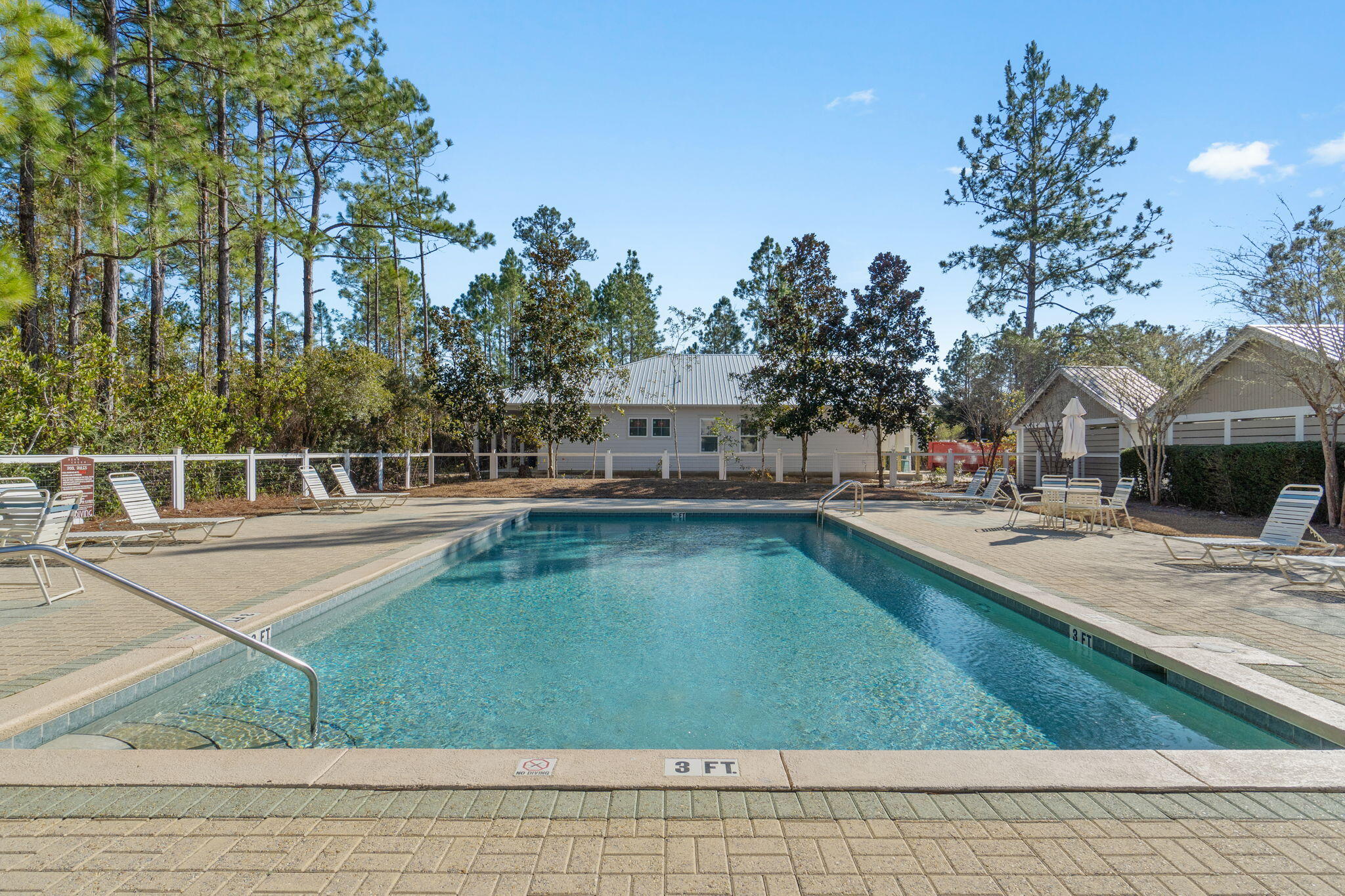 136 Hibernate Way Freeport, FL 32439 - Photo 49 of 55 a view of a swimming pool with a yard