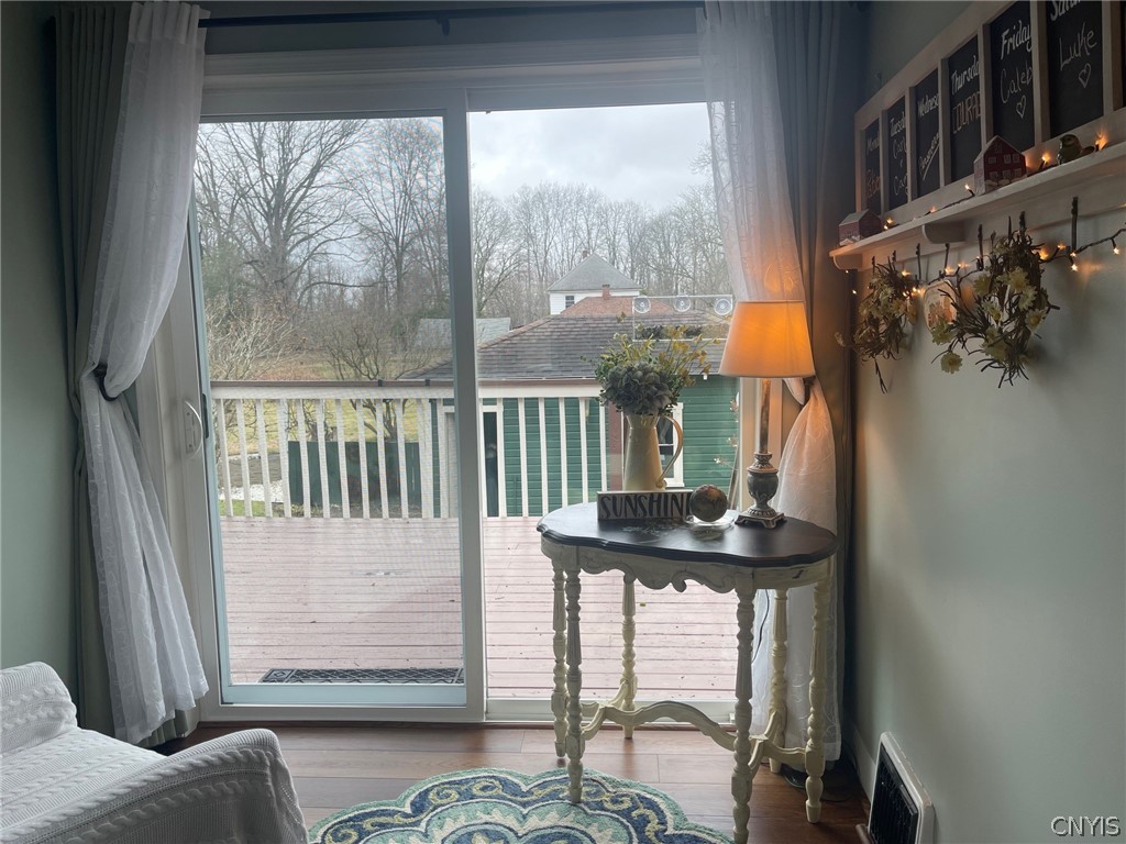 13 Castle Street Vernon, NY 13421 - Photo 20 of 49 Sitting room with sliding doors to rear deck