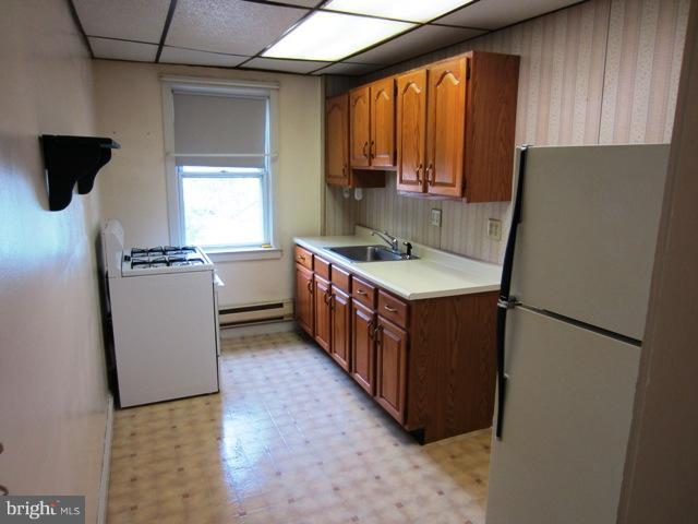 4908 Brookwood Road Baltimore, MD 21225 - Photo 7 of 16 Kitchen upstairs