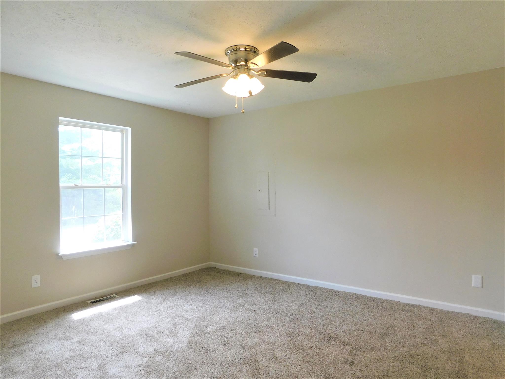 121 Rodeo Drive Columbia, TN 38401 - Photo 3 of 10 Master BR has new carpet, all repainted & new ceiling fan.