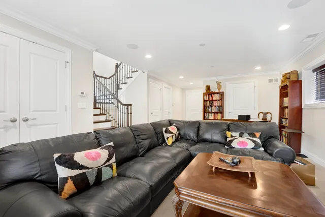 a living room with furniture and a couch