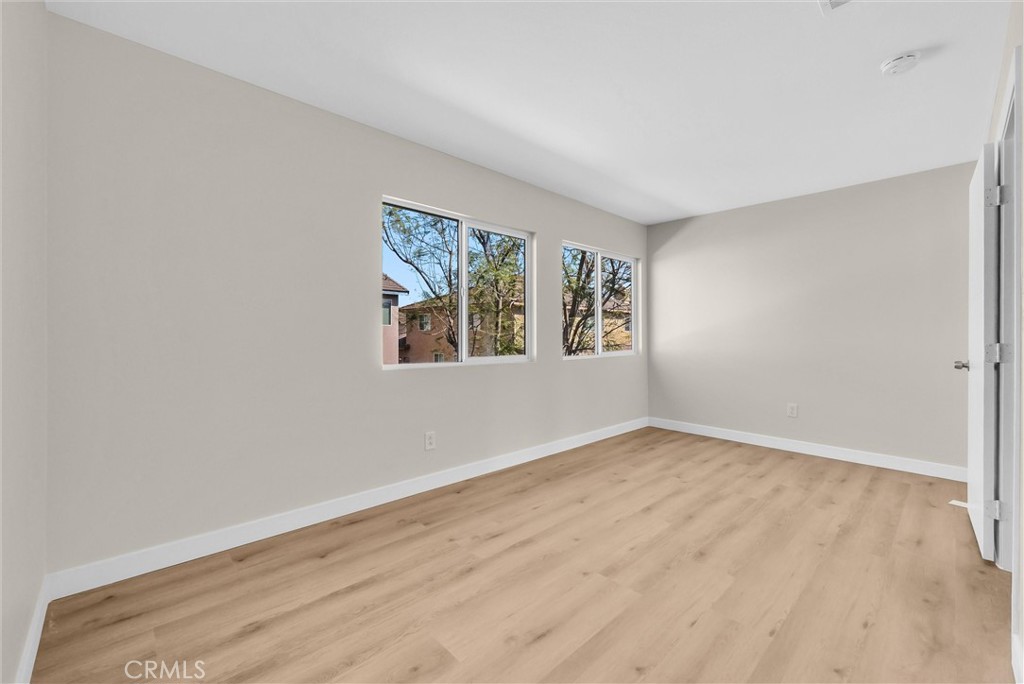 6732 Rico Court Eastvale, CA 92880 - Photo 18 of 30 an empty room with a window