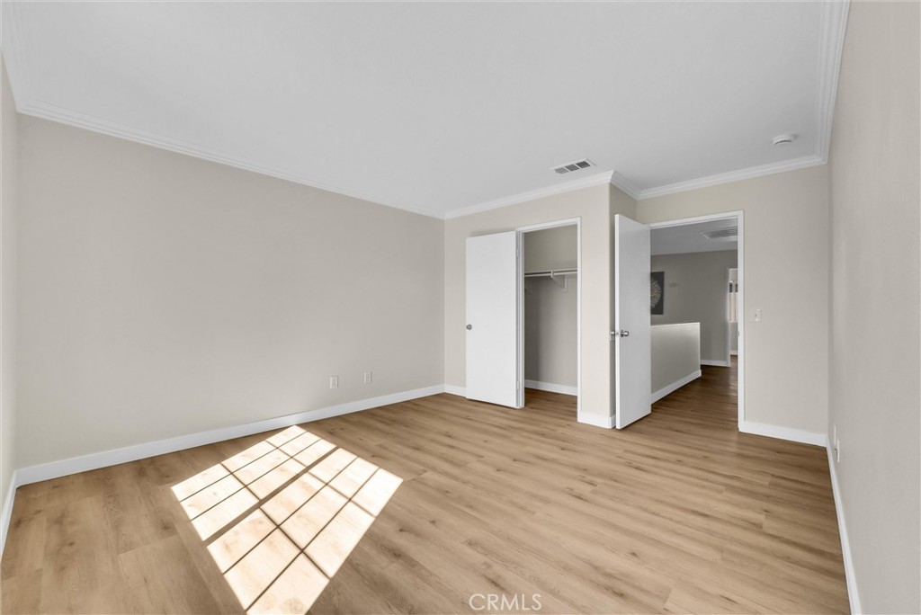 6732 Rico Court Eastvale, CA 92880 - Photo 22 of 30 a view of an empty room and window