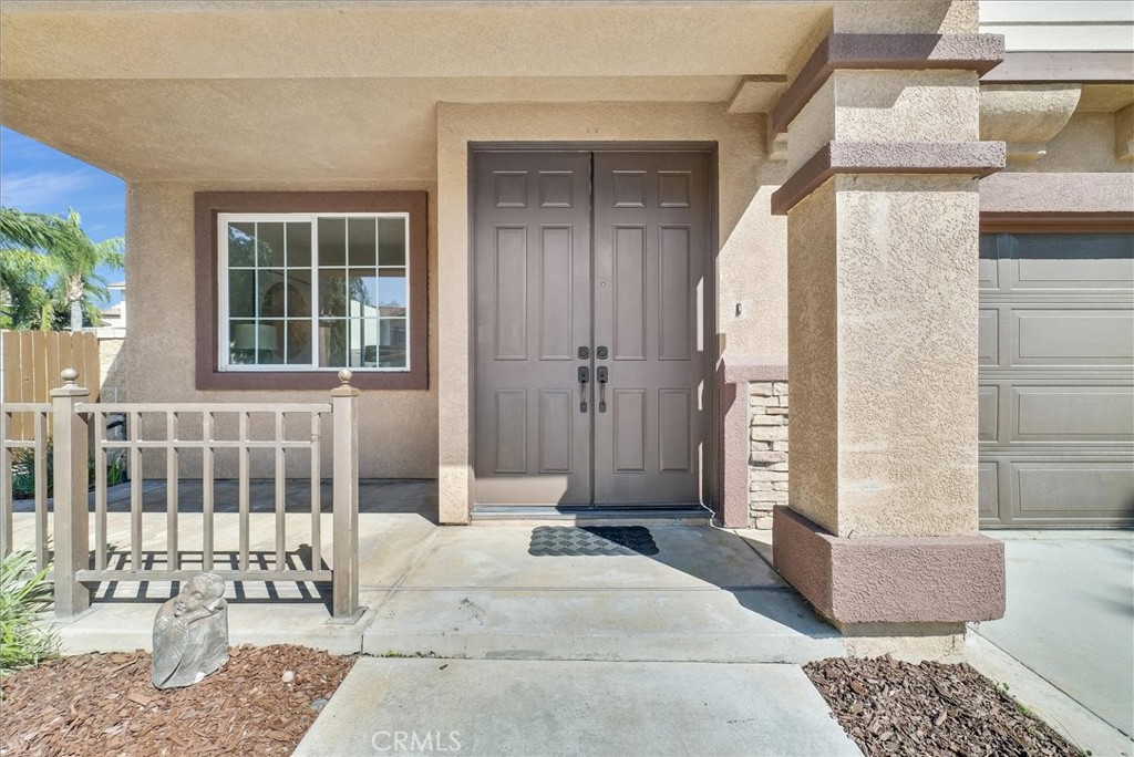 6732 Rico Court Eastvale, CA 92880 - Photo 4 of 30 a view of entrance door of the house