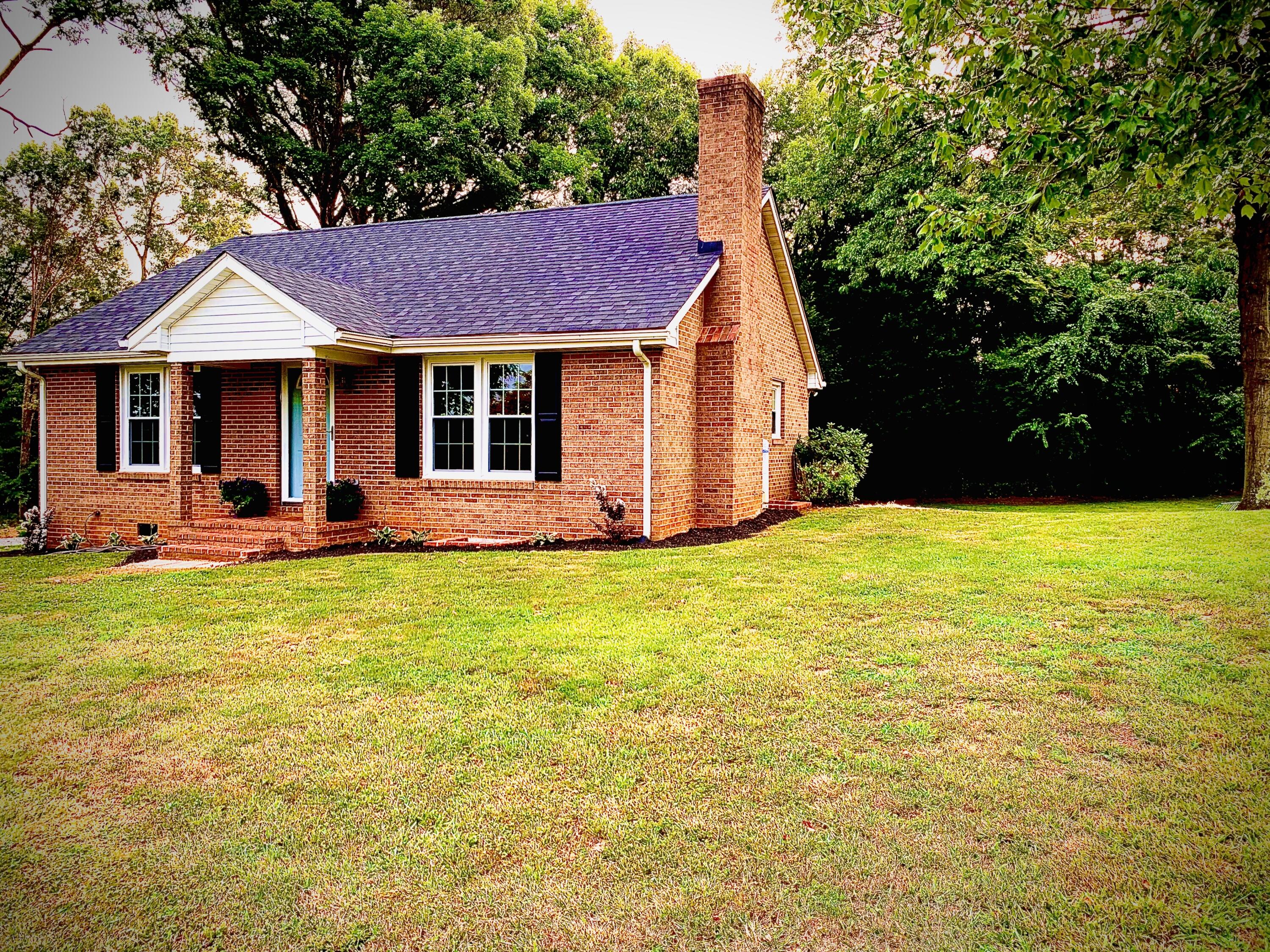1591 Sandy Level Road Goodview, VA 24095 - Photo 2 of 24 a view of a house with pool and sitting area
