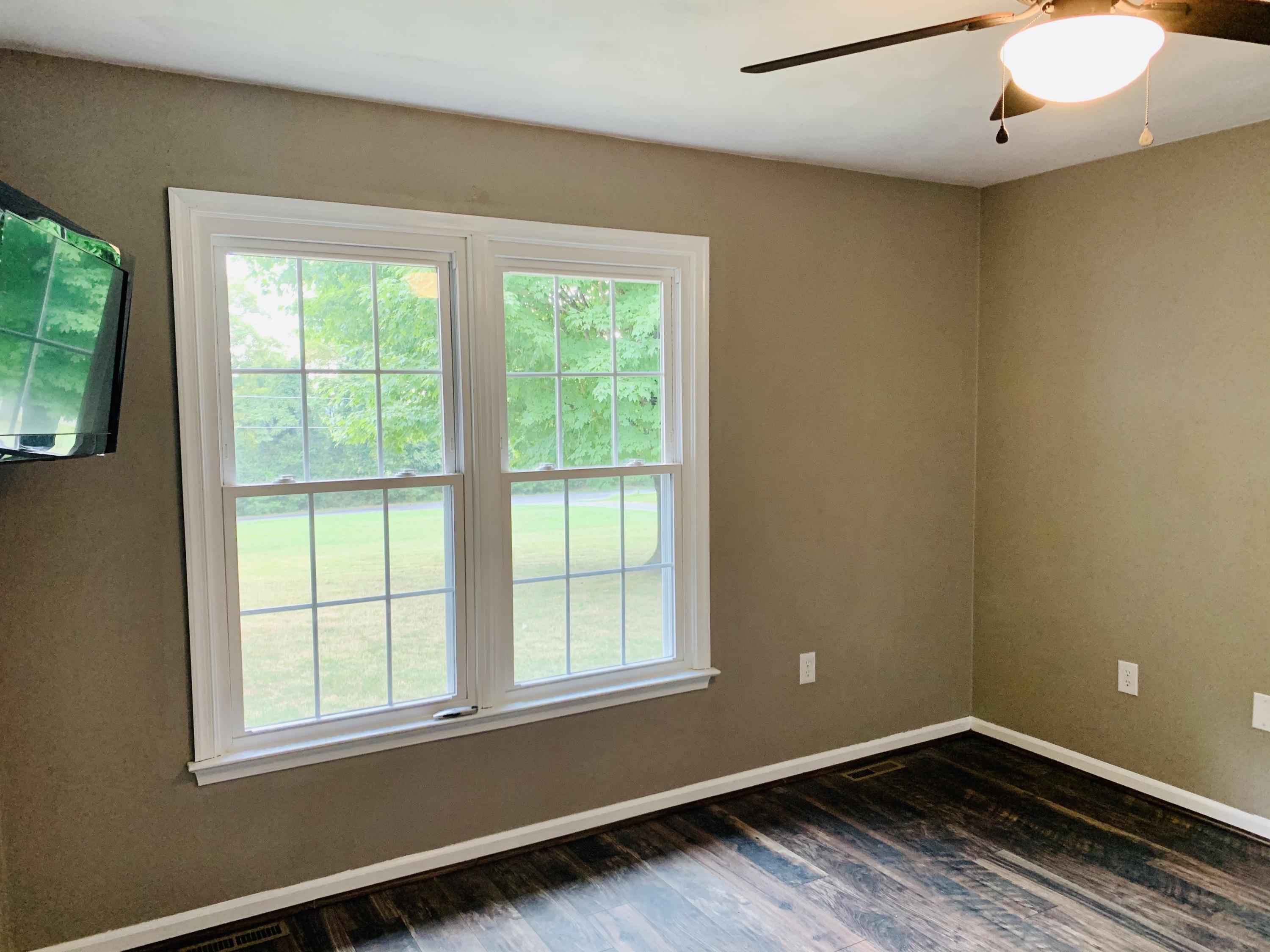 1591 Sandy Level Road Goodview, VA 24095 - Photo 15 of 24 an empty room with a window