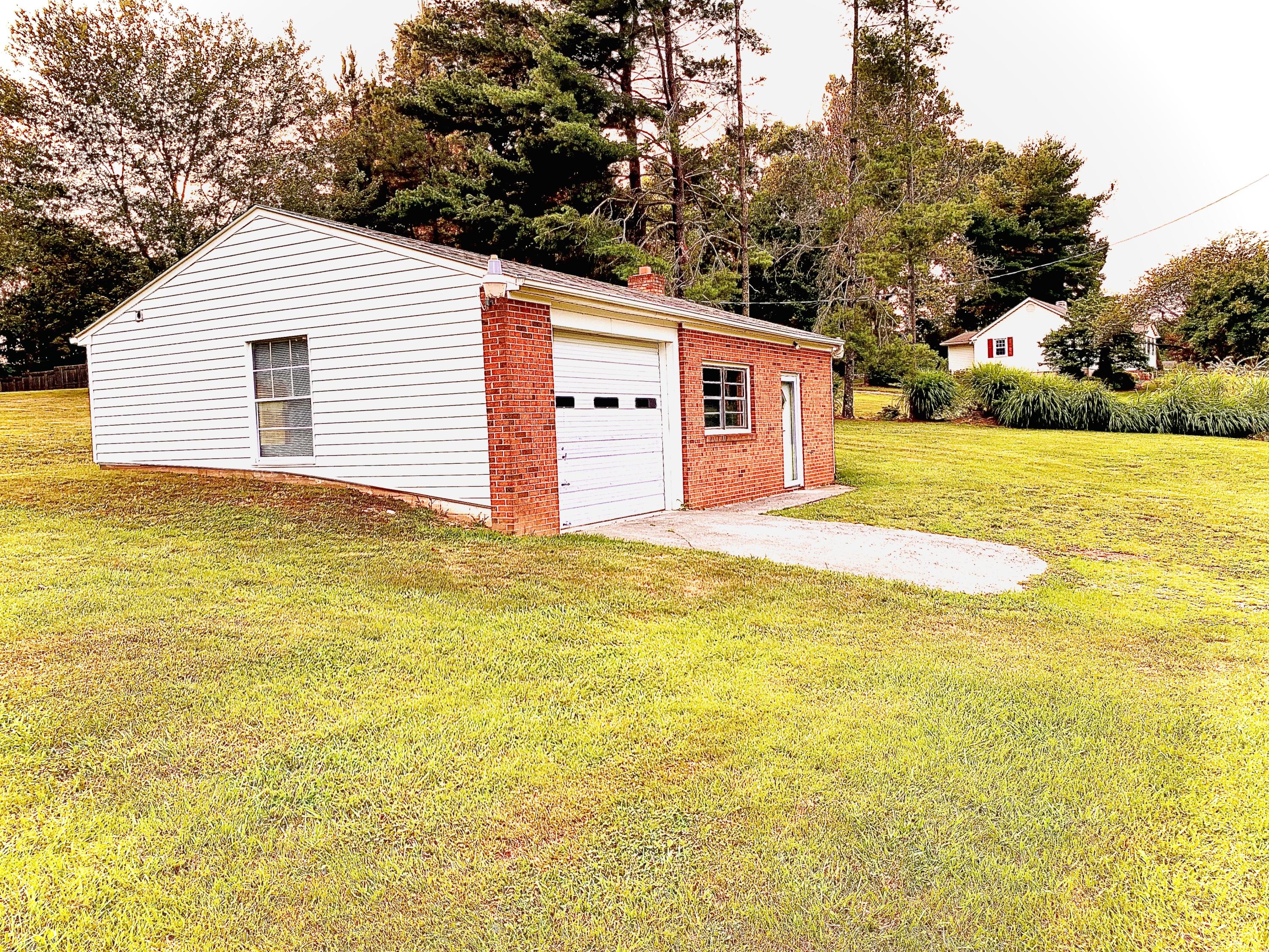 1591 Sandy Level Road Goodview, VA 24095 - Photo 20 of 24 a backyard of a building