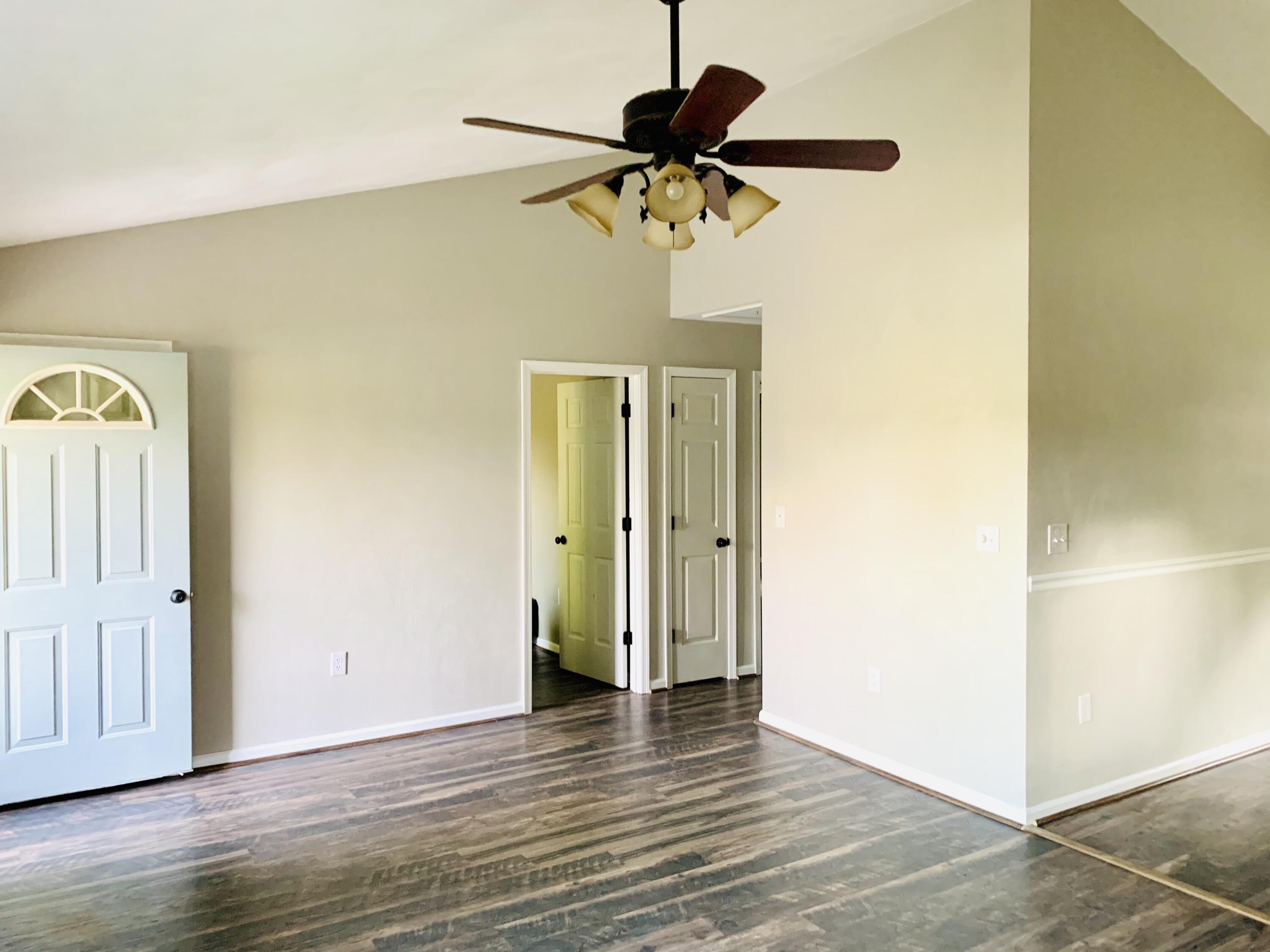 1591 Sandy Level Road Goodview, VA 24095 - Photo 6 of 24 a view of empty room with wooden floor