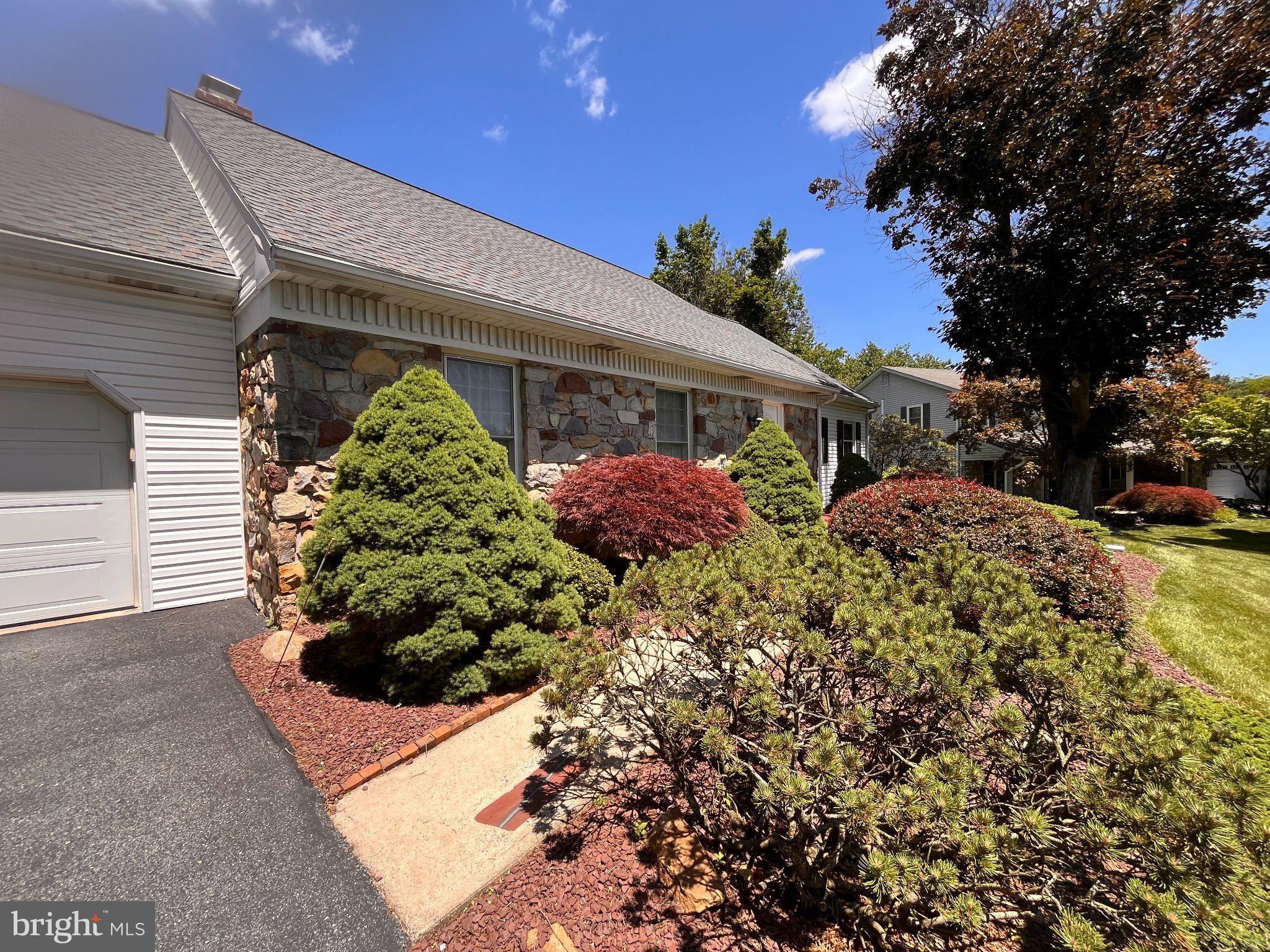 4053 Wedgewood Road Allentown, PA 18104 - Photo 4 of 8 Charming home with lush landscaping.