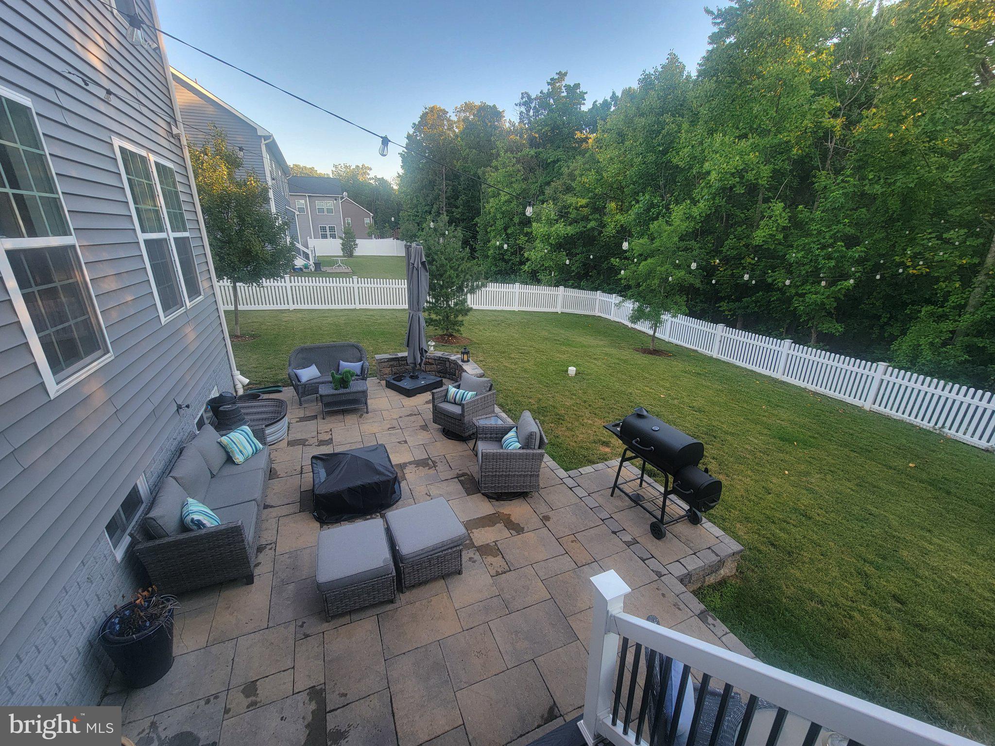 9901 Kildore Way Fort Washington, MD 20744 - Photo 7 of 7 Serene backyard retreat with greenery.