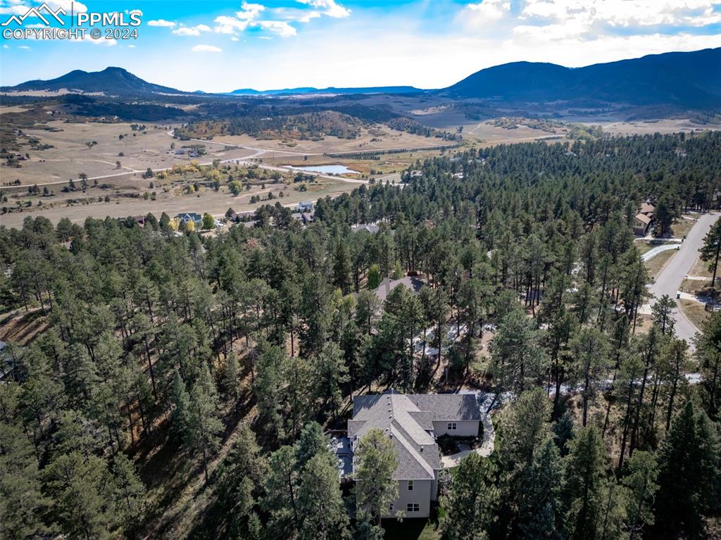 8174 Inca Road Larkspur, CO 80118 - Photo 47 of 50 an aerial view of residential house and sandy dunes