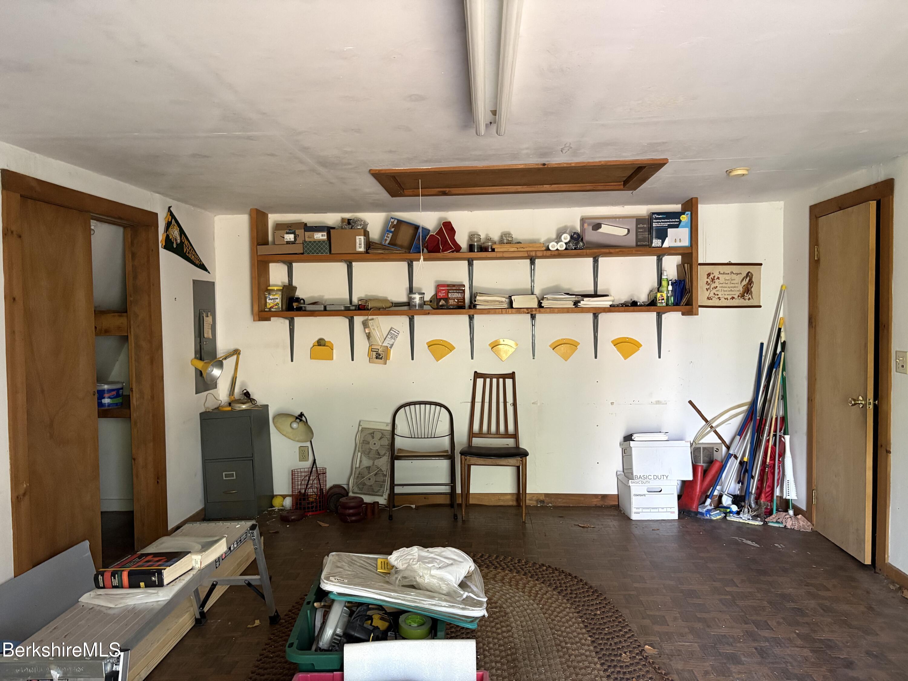 2110 West Center Road Otis, MA 01253 - Photo 21 of 24 a living room with lots of furniture and white walls