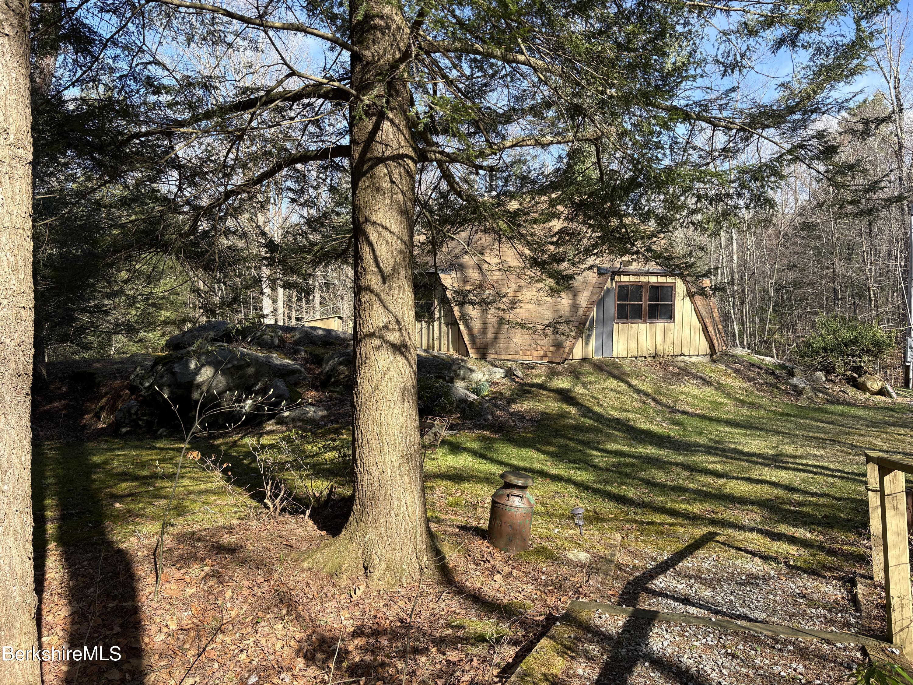 2110 West Center Road Otis, MA 01253 - Photo 3 of 24 a view of a house with backyard