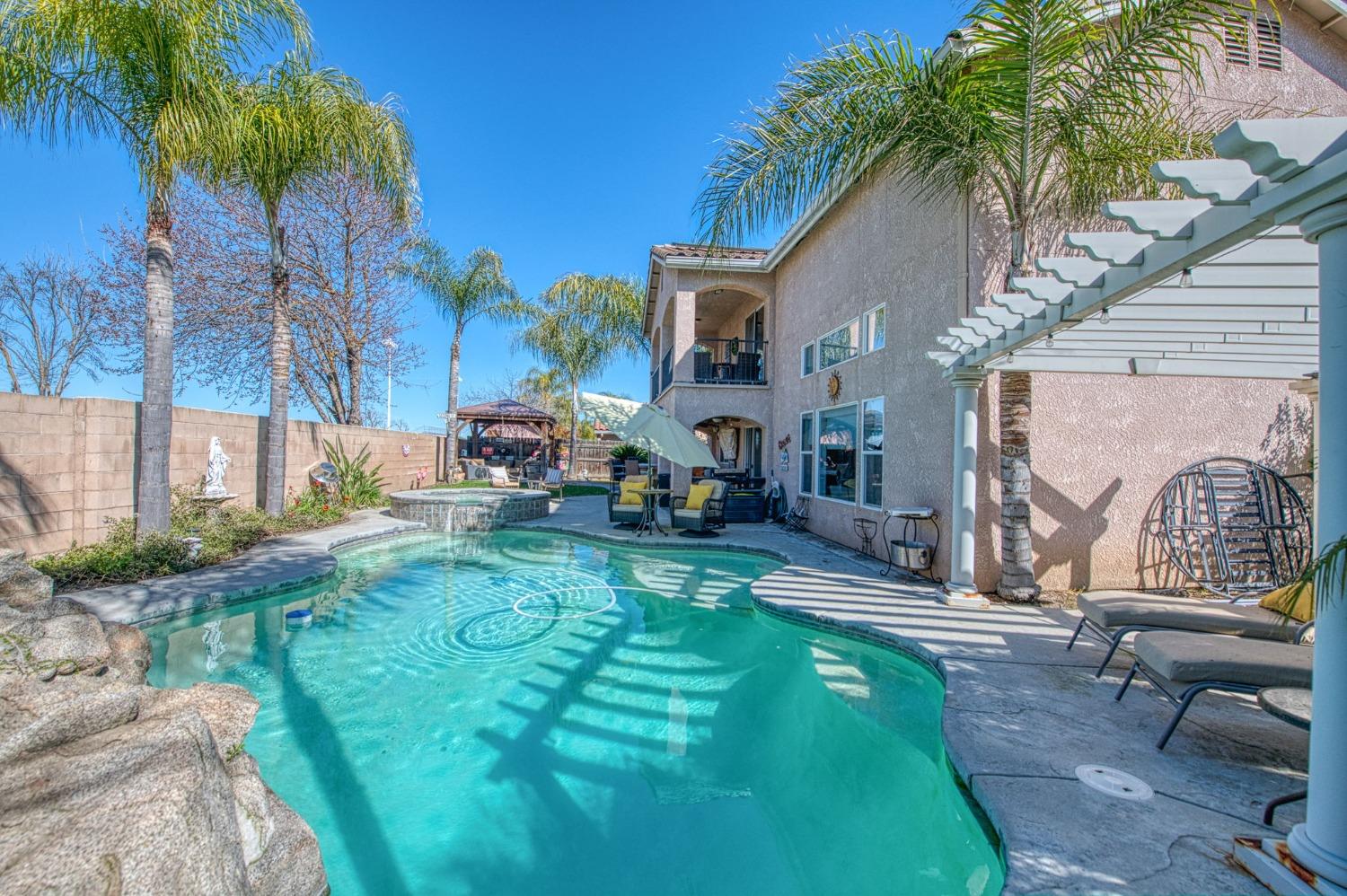 901 Maple Street Parlier, CA 93648 - Photo 57 of 67 a backyard of a house with seating space
