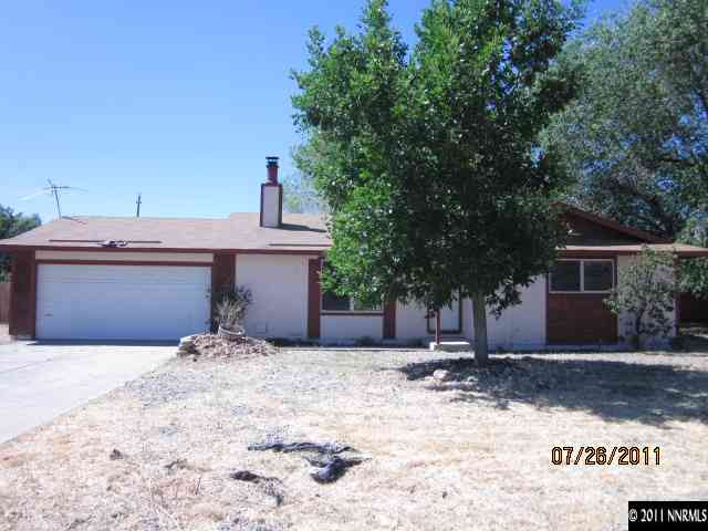 188 Ring Road Dayton, NV 89403 - Photo 1 of 9 a front view of a house with a yard