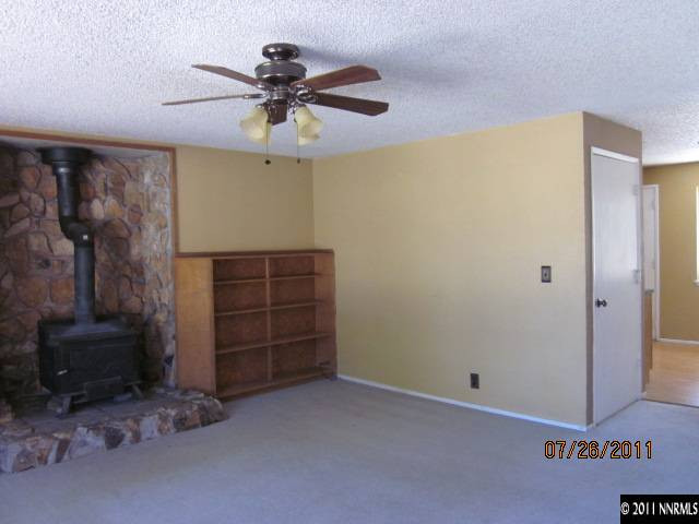 188 Ring Road Dayton, NV 89403 - Photo 2 of 9 a view of an empty room with a cabinet