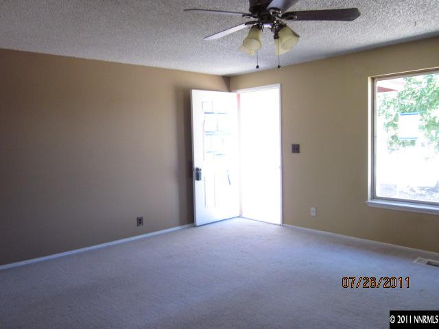 188 Ring Road Dayton, NV 89403 - Photo 3 of 9 an empty room with a window